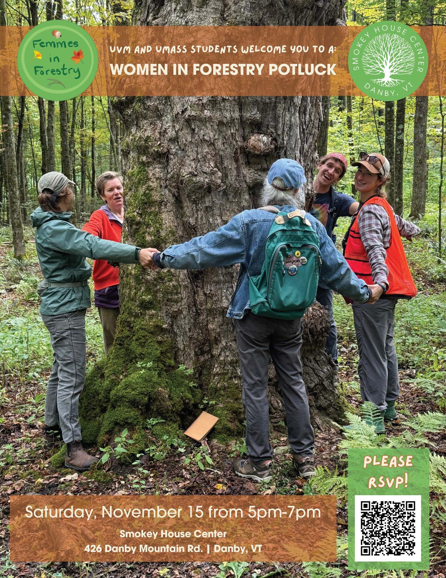 Women smile and hold hands around a large tree in a forest setting.