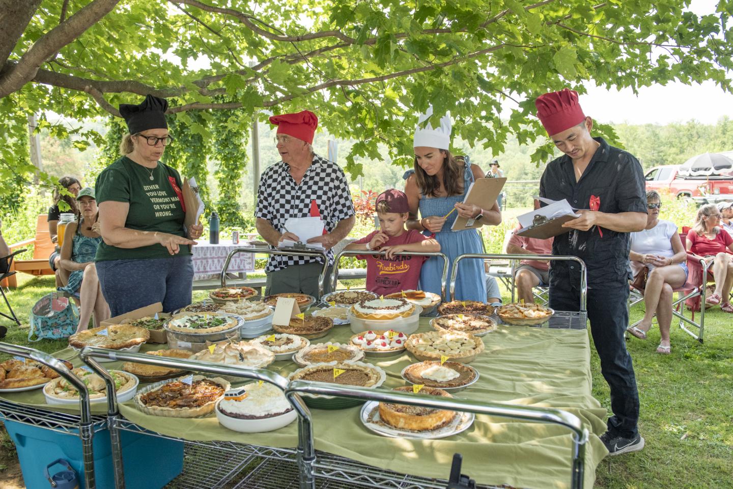 Judges critiquing Pie Submissions at the Maple Pie Contest.  Photo by: Blair Heagerty